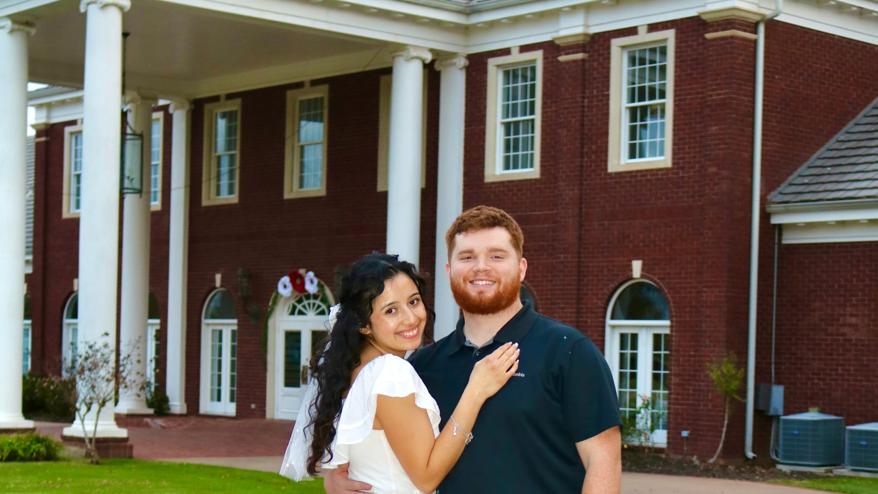 Stephen Henderson, owner of Fuego Softwash LLC, with his wife on their wedding day