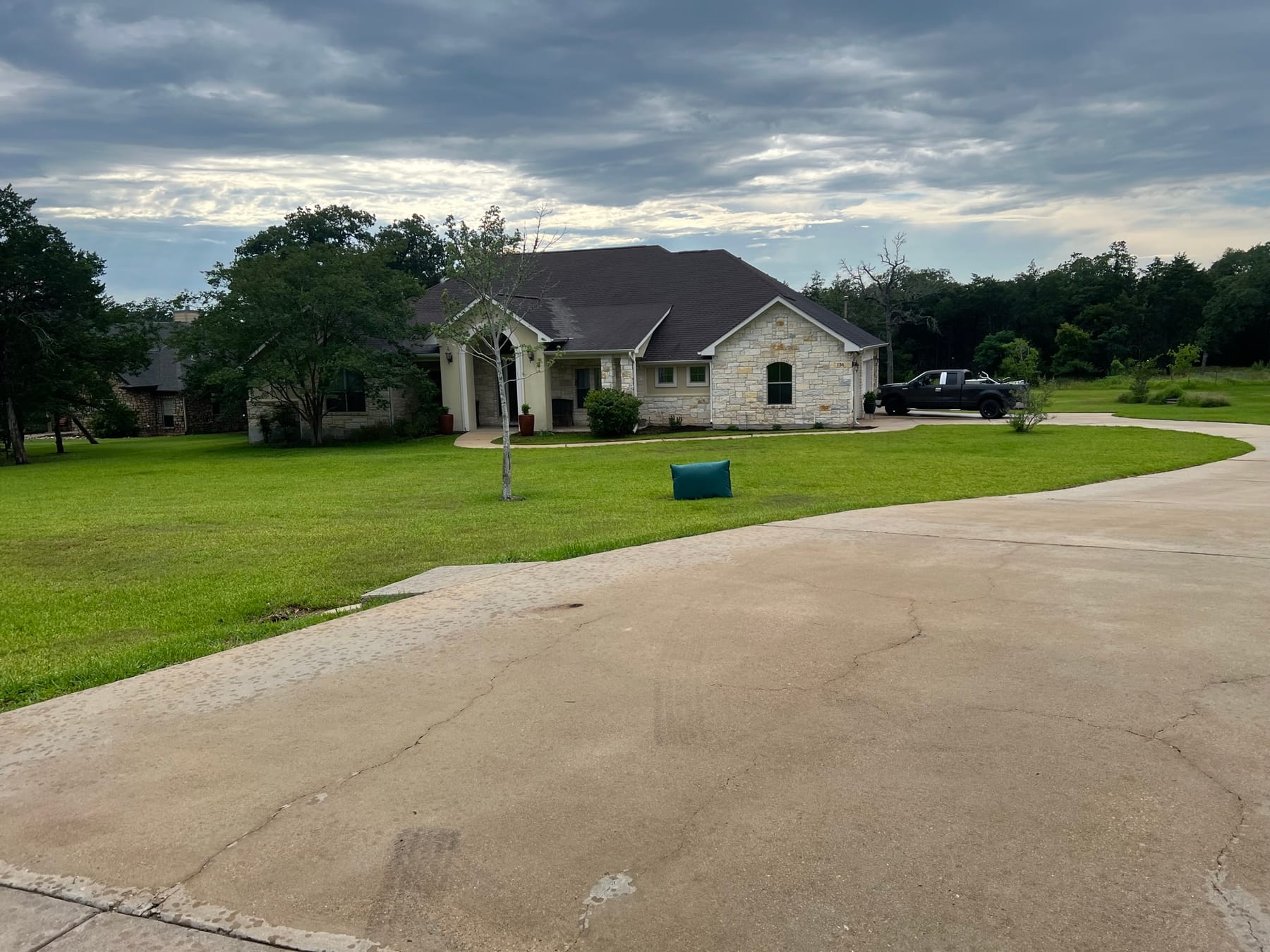 Freshly pressure washed driveway in Bastrop, TX